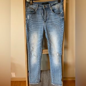 Risen, light wash skinny jeans. They are a size 5/27.